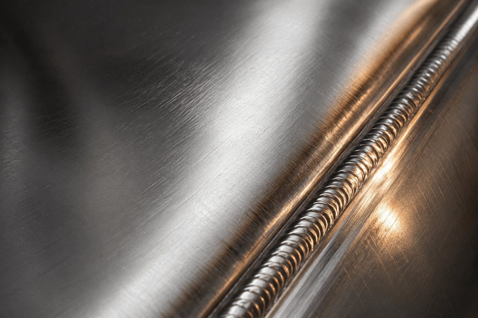 Macro detail of a stainless steel tank weld bead